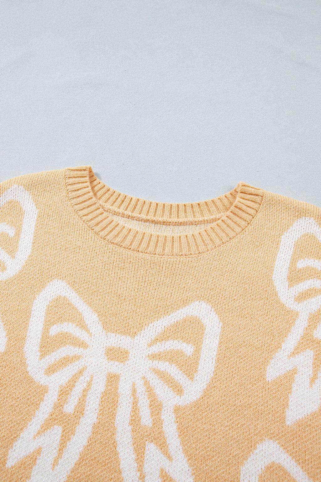 Bow Pattern Drop Shoulder Loose Sweater