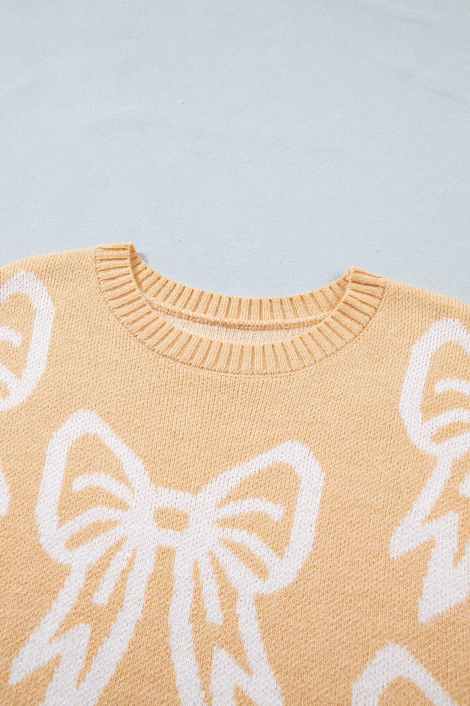 Bow Pattern Drop Shoulder Loose Sweater